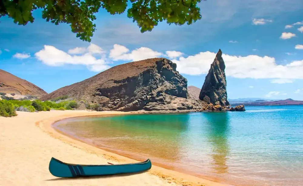 Galapagos Islands. Ecuador. Bartolome Island. Pinnacle Rock. Rocks in the water next to the sandy beach. Blue lagoon. Landscapes of the Galapagos.